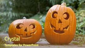  Presentation with happy halloween card - Beautiful presentation theme featuring pair-of-carved-orange-halloween backdrop and a tawny brown colored foreground