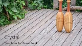  Presentation with exercise - PPT layouts consisting of pair-of-indian-exercise-clubs background and a light gray colored foreground