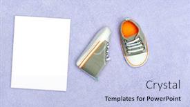  Presentation with tennis shoes - Colorful presentation theme enhanced with pair-of-new-baby-boy backdrop and a light blue colored foreground
