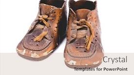  Presentation with baby shoes - Presentation theme featuring pair-of-old-bronzed-baby background and a soft green colored foreground