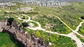  Presentation with green hills - Slides featuring panoramic-shot-overlooking-the-city background and a  colored foreground