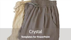  Presentation with cotton fabric - Slide deck enhanced with pants made of cotton folded trousers in light dark brown natural fabric cloths isolated on white background background and a gray colored foreground