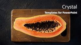  Presentation with papaya - Theme enhanced with papaya-chunk-on-a-black background and a black colored foreground
