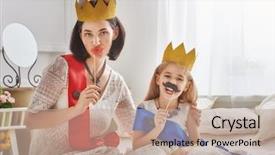  Presentation with queen - Presentation having funny family is preparing for a costume party mother and her child daughter girl with a paper accessories beautiful queen and princess in gold crowns playing together background and a coral colored foreground