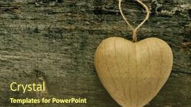  Presentation with ornament - PPT layouts enhanced with paperboard heart-shaped ornament on an old wooden surface with a copy space background and a tawny brown colored foreground