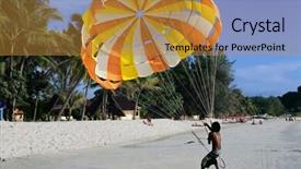  Presentation with paragliding - Beautiful presentation theme featuring paragliding on sand beach backdrop and a gold colored foreground