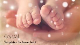  Presentation with baby christmas - PPT theme having parent hand holding baby feet closeup snowy effect christmas and family concept parent background and a coral colored foreground