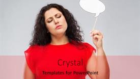  Presentation with bubble - Audience pleasing presentation theme consisting of party props photo booth and communication concept - displeased woman in red dress holding big blank speech bubble over grey background backdrop and a crimson colored foreground