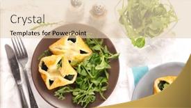 Presentation with spinach - Presentation with pastry filling with spinach and salad background and a lemonade colored foreground