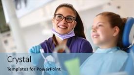 Presentation with dental x ray - PPT layouts having patient care technician - smiling female dentist with young background and a light blue colored foreground