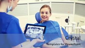  Presentation with dentist xray - Amazing PPT theme having patient girl at dental backdrop and a teal colored foreground