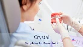  Presentation with malocclusion - Slide deck having patient-looks-attentively-at-denture background and a sky blue colored foreground