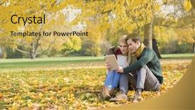  Presentation with tablet - Theme featuring pc in park during autumn background and a yellow colored foreground