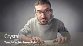  Presentation with keyboard - Audience pleasing PPT theme consisting of pc student - young man typing backdrop and a gray colored foreground