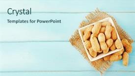  Presentation with peanuts - PPT theme enhanced with peanuts in the bowl on blue wooden background background and a cool aqua colored foreground