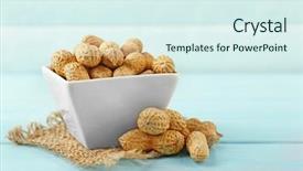  Presentation with peanuts - Theme enhanced with peanuts in the bowl on blue wooden background background and a sky blue colored foreground
