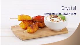  Presentation with almonds - Theme consisting of pear and orange skewers with bowl of yogurt chopped nuts and almonds on wooden cutting board background and a sky blue colored foreground
