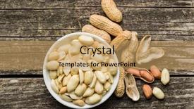  Presentation with peanut - Audience pleasing presentation consisting of peeled peanuts on wooden table backdrop and a coral colored foreground