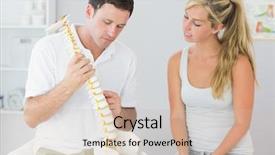  Presentation with pelvis - Audience pleasing PPT theme consisting of pelvis - handsome physiotherapist showing patient something backdrop and a soft green colored foreground