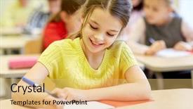  Presentation with elementary school - Audience pleasing PPT layouts consisting of pens and notebooks writing backdrop and a yellow colored foreground