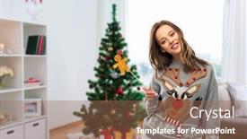  Presentation with ugly christmas sweater - Theme enhanced with people and holidays concept - happy young woman in jumper with reindeer pattern holding gingerbread accessory at ugly sweater party over christmas tree on home background background and a violet colored foreground