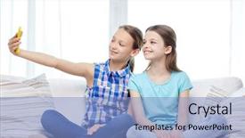  Presentation with friendship - PPT layouts enhanced with people children technology friends and friendship concept - happy little girls sitting on sofa and taking selfie with smartphone at home background and a light blue colored foreground