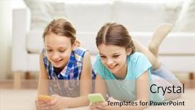  Presentation with smartphones - Slides having people children technology friends and friendship concept - happy little girls with smartphones lying on floor at home background and a soft green colored foreground