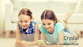  Presentation with smartphones - Beautiful presentation theme featuring people children technology friends and friendship concept - happy little girls with smartphones lying on floor at home backdrop and a lemonade colored foreground