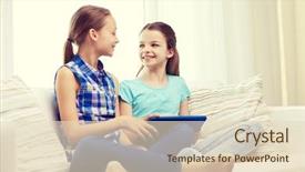  Presentation with children talking - Amazing PPT theme having people children technology friends and friendship concept - happy little girls with tablet pc computer sitting on sofa and talking at home backdrop and a lemonade colored foreground