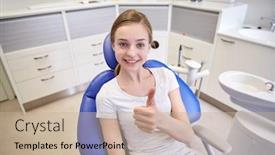  Presentation with health-care - Colorful slides enhanced with people medicine stomatology and health care concept - happy patient girl showing thumbs up at dental clinic office backdrop and a soft green colored foreground