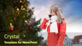  Presentation with town hall - Cool new theme with people season and leisure concept - happy smiling woman in winter fur hat calling on smartphone over christmas tree at tallinn old town hall square background backdrop and a tawny brown colored foreground