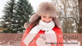  Presentation with forest winter - Cool new slides with people season and leisure concept - happy woman in fur hat with smartphone over winter forest background and show backdrop and a coral colored foreground