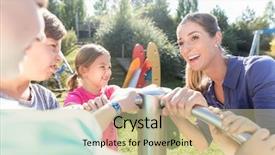  Presentation with black couple having fun - PPT theme consisting of people seesaw - happy family having fun background and a mint green colored foreground