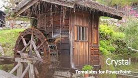  Presentation with spinning wheel - Beautiful presentation featuring traditional wooden water wheel spinning at tsumago - juku in tsumago a preserved historical town in japan backdrop and a violet colored foreground