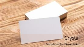  Presentation with business cards - Cool new slides with personal marketing - blank business cards on wooden backdrop and a coral colored foreground