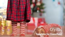  Presentation with dog christmas - Colorful theme enhanced with pet dog jack russell terrier and legs of a little girl in red white striped socks celebrating christmas at home by the new year tree backdrop and a coral colored foreground