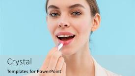  Presentation with lip balm - Slides enhanced with photo of beautiful young woman posing isolated over blue background holding lip balm background and a coral colored foreground