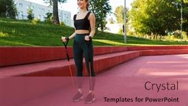  Presentation with green morning - Slide deck with photo of strong sporty woman 20s wearing tracksuit stretching her arms with expander fitness rope during morning workout in green park background and a coral colored foreground