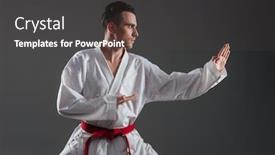  Presentation with kimono - Amazing PPT theme having photo of young sportsman dressed in kimono practice in karate isolated over grey background looking aside backdrop and a dark gray colored foreground