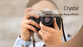  Presentation with camera film - PPT theme consisting of photographer with film camera making background and a coral colored foreground