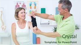  Presentation with doctor office - Audience pleasing PPT theme consisting of doctor examining his patients wrist backdrop and a soft green colored foreground