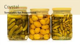  Presentation with cucumbers - Theme featuring pickled cucumbers and olives in glass jar background and a yellow colored foreground
