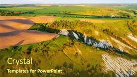  Presentation with earth eye - Presentation design consisting of picturesque-countryside-with-green-hills background and a tawny brown colored foreground
