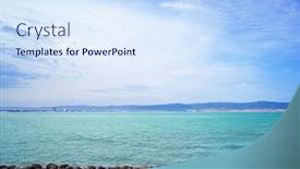  Presentation with rocky shore - Audience pleasing PPT theme consisting of picturesque seascape of rocky beach with misty shore backdrop and a sky blue colored foreground