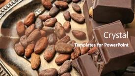  Presentation with cocoa beans - Presentation consisting of pieces of chocolate and cocoa beans on metal tray closeup background and a tawny brown colored foreground