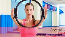  Presentation with pilates - PPT theme enhanced with pilates woman magic ring hands exercise workout at gym indoor background and a coral colored foreground