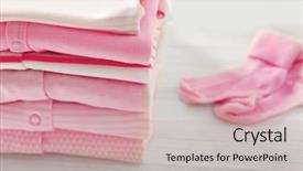  Presentation with baby clothes - Beautiful presentation theme featuring pile of baby clothes backdrop and a coral colored foreground