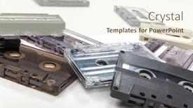  Presentation with cassette - Beautiful PPT theme featuring pile of compact audio cassette tapes on a white background backdrop and a cream colored foreground