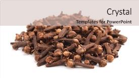  Presentation with clove - Theme enhanced with pile of dried cloves spice background and a soft green colored foreground