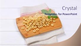  Presentation with cutting board - Theme enhanced with pile of honey cereal rings on wooden cutting board background and a sky blue colored foreground